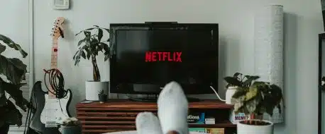 black flat screen tv turned on displaying 11