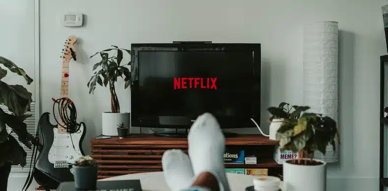 black flat screen tv turned on displaying 11